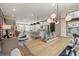 Open-concept layout with a dining room connected to the kitchen and living area at 125 Werner Brook Sw Way, Atlanta, GA 30354