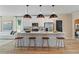 Bright kitchen showcases a large island with barstool seating and stainless steel appliances at 125 Werner Brook Sw Way, Atlanta, GA 30354