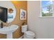 Stylish powder room with modern fixtures and finishes at 125 Werner Brook Sw Way, Atlanta, GA 30354