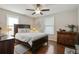 Bedroom featuring hardwood floors, a ceiling fan, and bright windows at 1916 Cannon St, Decatur, GA 30032
