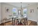 Bright dining room with large windows and a stylish chandelier at 1916 Cannon St, Decatur, GA 30032