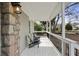 Inviting front porch with stone details, classic chairs, and views of the neighborhood at 1916 Cannon St, Decatur, GA 30032