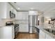 Stylish kitchen with white cabinets, stainless steel appliances, and granite countertops at 1916 Cannon St, Decatur, GA 30032
