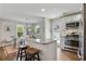 Modern kitchen with stainless steel appliances, granite countertops, and ample counter space at 1916 Cannon St, Decatur, GA 30032