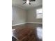 Bedroom featuring hardwood flooring, natural light and neutral colors at 197 Upshaw Sw St, Atlanta, GA 30315