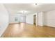 Spacious unfinished basement with light hardwood floors, walk out door, and ample storage at 103 Timber Ridge Dr, Cartersville, GA 30121