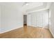 A bright bedroom features hardwood floors and neutral wall paint at 103 Timber Ridge Dr, Cartersville, GA 30121