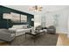 Bright living room with contemporary decor, stylish rug, and plenty of natural light at 103 Timber Ridge Dr, Cartersville, GA 30121