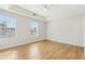 Bright and airy main bedroom featuring hardwood floors, neutral colors, and ample natural light at 103 Timber Ridge Dr, Cartersville, GA 30121
