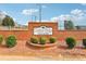 Brick sign for Timber Ridge Town Homes set in a well maintained landscape with manicured bushes at 103 Timber Ridge Dr, Cartersville, GA 30121