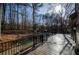 Spacious deck overlooking a private wooded area, perfect for enjoying nature and outdoor living at 150 Karina Pl, Canton, GA 30115