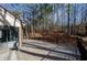 Expansive deck overlooking the landscaped backyard, perfect for outdoor entertaining and relaxation at 150 Karina Pl, Canton, GA 30115