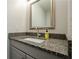 Close up of the bathroom featuring a grey granite vanity and sink at 150 Karina Pl, Canton, GA 30115