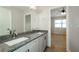 Bright bathroom with a double sink vanity and lots of natural light at 150 Karina Pl, Canton, GA 30115