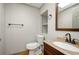 Stylish half bathroom showcasing a modern vanity, sleek fixtures, and a clean, fresh design at 150 Karina Pl, Canton, GA 30115