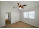 Cozy carpeted bedroom with a closet and a window, creating a relaxing atmosphere at 150 Karina Pl, Canton, GA 30115