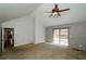 Spacious bedroom featuring vaulted ceilings, and sliding glass doors to the outdoor deck at 150 Karina Pl, Canton, GA 30115