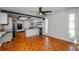 Modern kitchen with granite countertops, stainless steel appliances, and open dining area at 150 Karina Pl, Canton, GA 30115