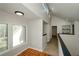 Inviting landing featuring tiled floors and large windows providing ample natural light at 150 Karina Pl, Canton, GA 30115