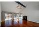 Bright living room with vaulted ceilings, fireplace, and sliding doors to outdoor space at 150 Karina Pl, Canton, GA 30115