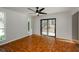 Bright room with tiled flooring, sliding glass door access to the outdoors, and natural light at 150 Karina Pl, Canton, GA 30115