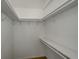 Walk-in closet with rod and shelves for storage at 150 Karina Pl, Canton, GA 30115