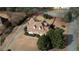 Aerial view of the property showcasing house with a large yard surrounded by trees at 5770 Wyndemere Ln, Stone Mountain, GA 30087