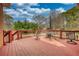 View of the home's deck furnished with comfortable seating, perfect for outdoor relaxation and enjoying the backyard scenery at 5770 Wyndemere Ln, Stone Mountain, GA 30087