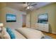 A furnished bedroom features a bed, dresser, and artwork adding a touch of elegance at 5770 Wyndemere Ln, Stone Mountain, GA 30087