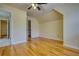 Bedroom with beautiful hardwood floors and light-yellow painted walls at 5770 Wyndemere Ln, Stone Mountain, GA 30087
