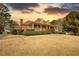 Charming brick home with inviting front porch and meticulously maintained landscaping at 5770 Wyndemere Ln, Stone Mountain, GA 30087