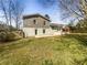 Well-maintained backyard with a patio, and mature trees at 6296 Flamingo Way, Morrow, GA 30260