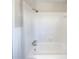 Bright white tiled bathroom with shower and tub combination at 6296 Flamingo Way, Morrow, GA 30260