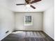 Bedroom with carpet, a ceiling fan, and a window at 6296 Flamingo Way, Morrow, GA 30260