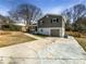 Attractive two-story home with driveway and manicured front yard at 6296 Flamingo Way, Morrow, GA 30260