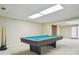 Finished basement with a pool table offers space for entertaining at 11710 Mountain Laurel Dr, Roswell, GA 30075