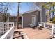 Back deck and side of the house with chairs and seating for enjoying the weather at 975 Malibu Dr, Marietta, GA 30066