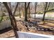 Backyard firepit area with surrounding chairs, perfect for entertaining guests at 975 Malibu Dr, Marietta, GA 30066