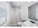 Bathroom with a glass shower door, gray color scheme, and white vanity with sink and mirror at 975 Malibu Dr, Marietta, GA 30066