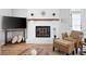 Close-up of the fireplace with white brick surround and decorative mantel at 975 Malibu Dr, Marietta, GA 30066