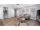Comfortable living area with wood flooring, a fireplace, and a decorative front door at 975 Malibu Dr, Marietta, GA 30066