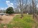 Large backyard with a sparkling pool, perfect for outdoor entertaining and relaxation at 102 Rosebury Dr, Canton, GA 30115