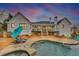 Inviting backyard pool area with lounge chairs and a spacious patio, ideal for outdoor relaxation and entertaining at 102 Rosebury Dr, Canton, GA 30115