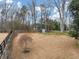 Spacious backyard with a shed, offering ample space for storage and outdoor activities at 102 Rosebury Dr, Canton, GA 30115