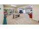Finished basement with shelving, carpet flooring and lots of space for recreation at 102 Rosebury Dr, Canton, GA 30115