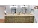 Dual sink bath vanity offers generous countertop space and great storage at 102 Rosebury Dr, Canton, GA 30115
