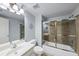 Bathroom with a combination shower and tub with a sliding glass door at 102 Rosebury Dr, Canton, GA 30115