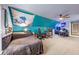 Teen bedroom featuring a gaming chair, and unique wall decor at 102 Rosebury Dr, Canton, GA 30115