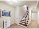 Entryway with stairs, fresh paint and decor at 102 Rosebury Dr, Canton, GA 30115