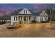 Beautiful two-story home with a manicured lawn and charming curb appeal featuring a stone foundation at 102 Rosebury Dr, Canton, GA 30115